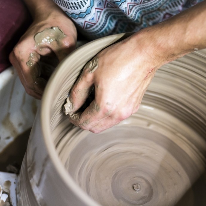 A student tries pottery.
