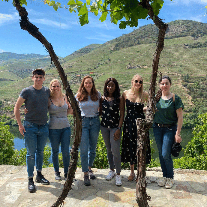 Elizabeth in Portugal with trees and the sun out