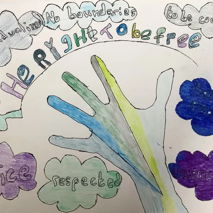 A drawing: 'The Right to be Free' is written on a poster with a hand reaching out
