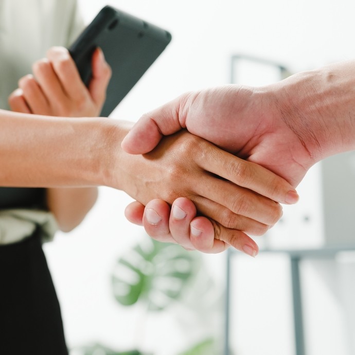 Close up of a handshake