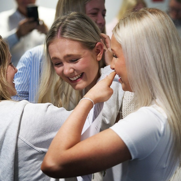 girls looking overjoyed and overwhelmed 