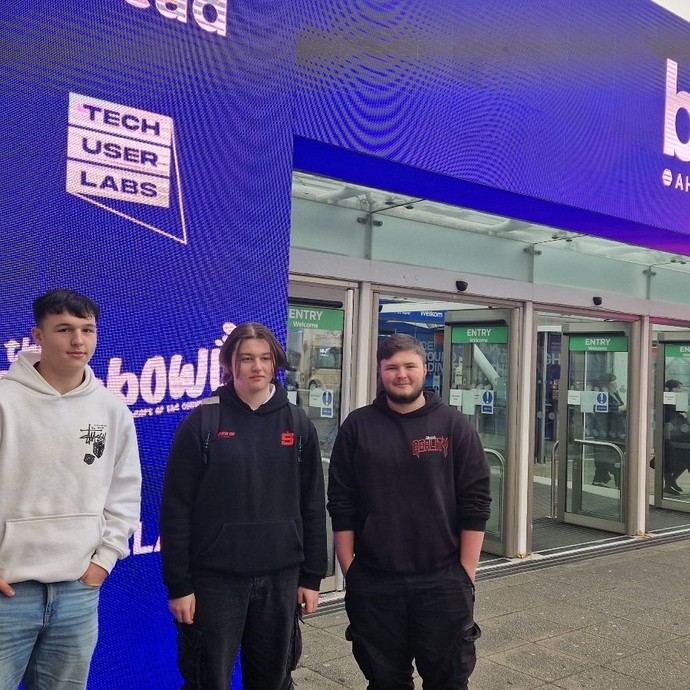 3 students outside the BETT venue
