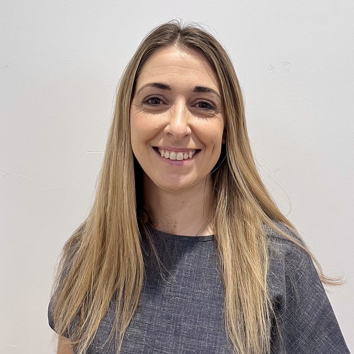 Caryl headshot in her grey uniform