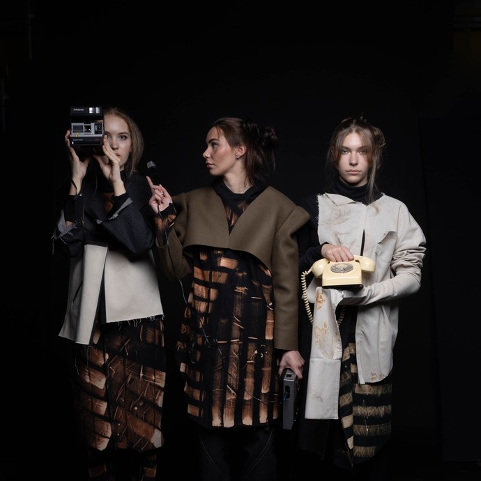 Three models wearing an example of what will be shown at the catwalk event