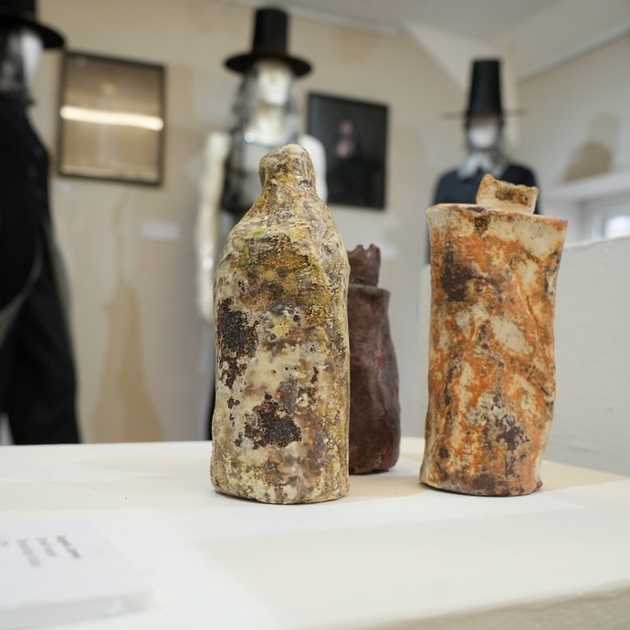 Some ceramics work with mannequins in the background