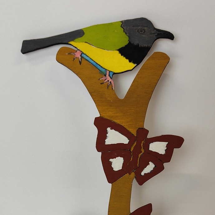 A love spoon with floral and wildlife focus