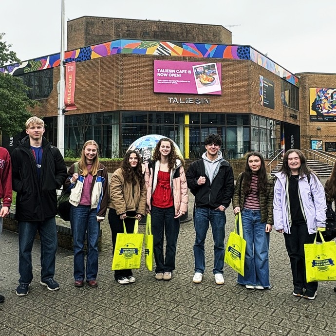 Students standing outside the university's Taliesin Theatre