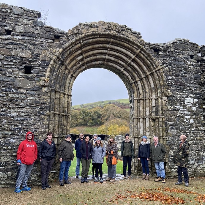Students at the Abbey with the iconic archway